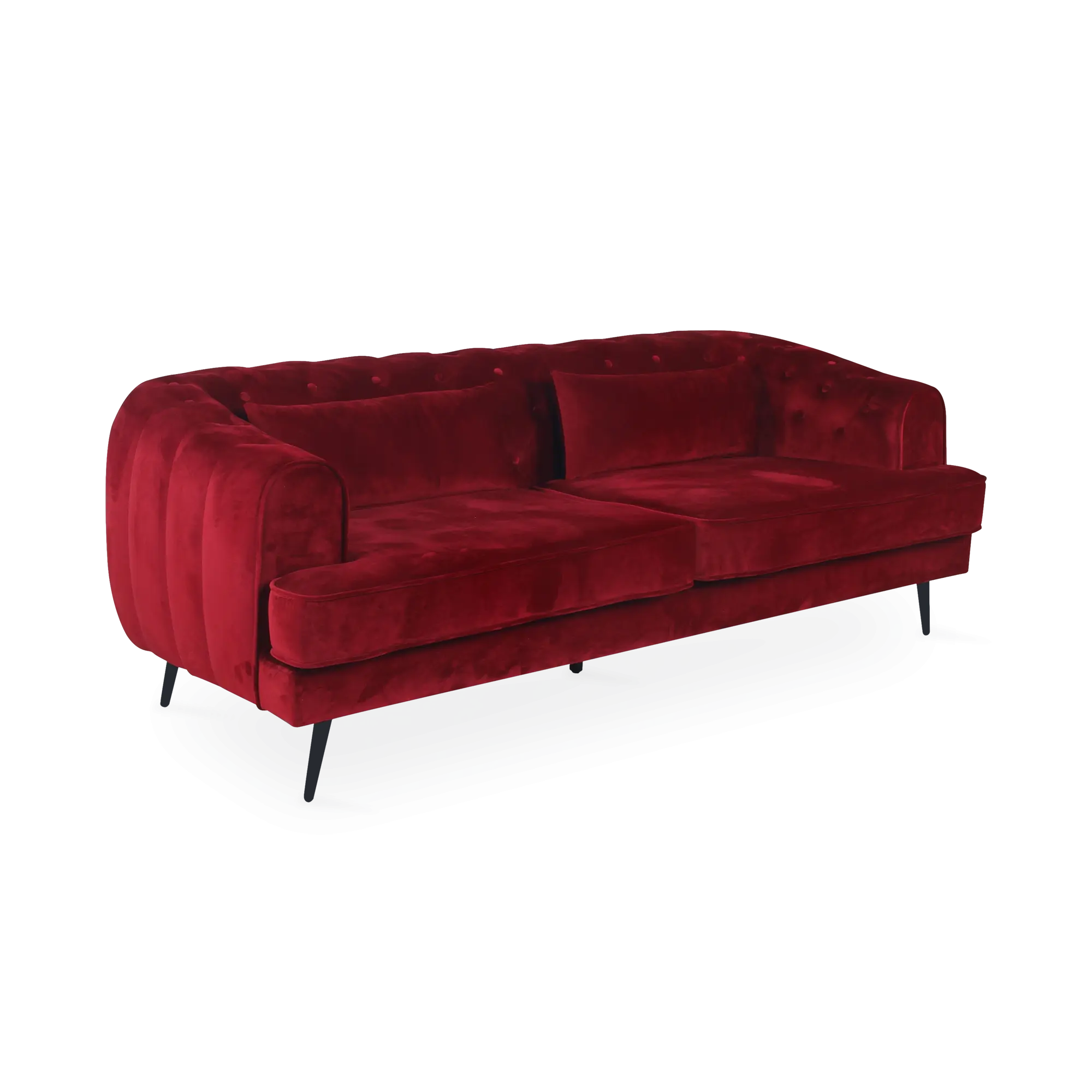 Sofá de terciopelo rojo con reposabrazos dorado sobre fondo de